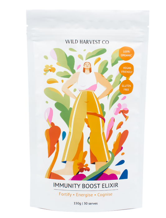 Wild Harvest Co Immunity Boost Elixir Pouch with woman standing up with hands on heaps and flowers around her